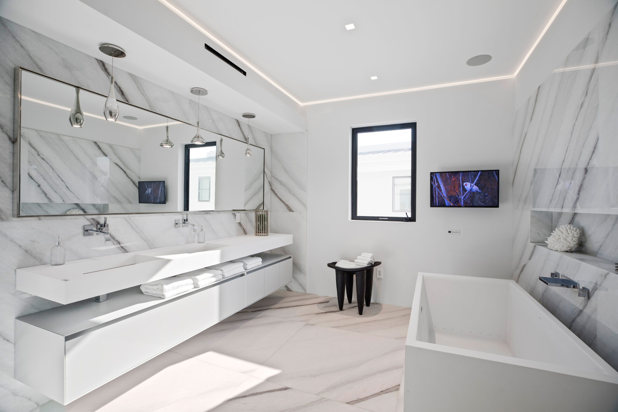 Integrated bathroom and vanity lighting by LIT Group in a luxury residential build.
